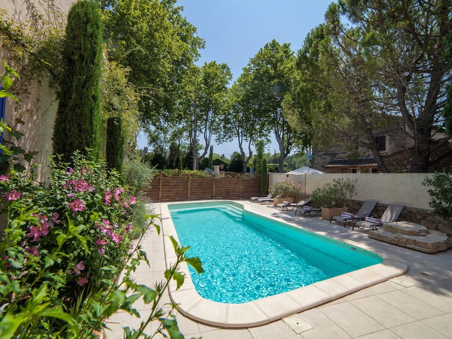 Seasonal outdoor pool, open 9:00 AM to 7:30 PM, pool loungers