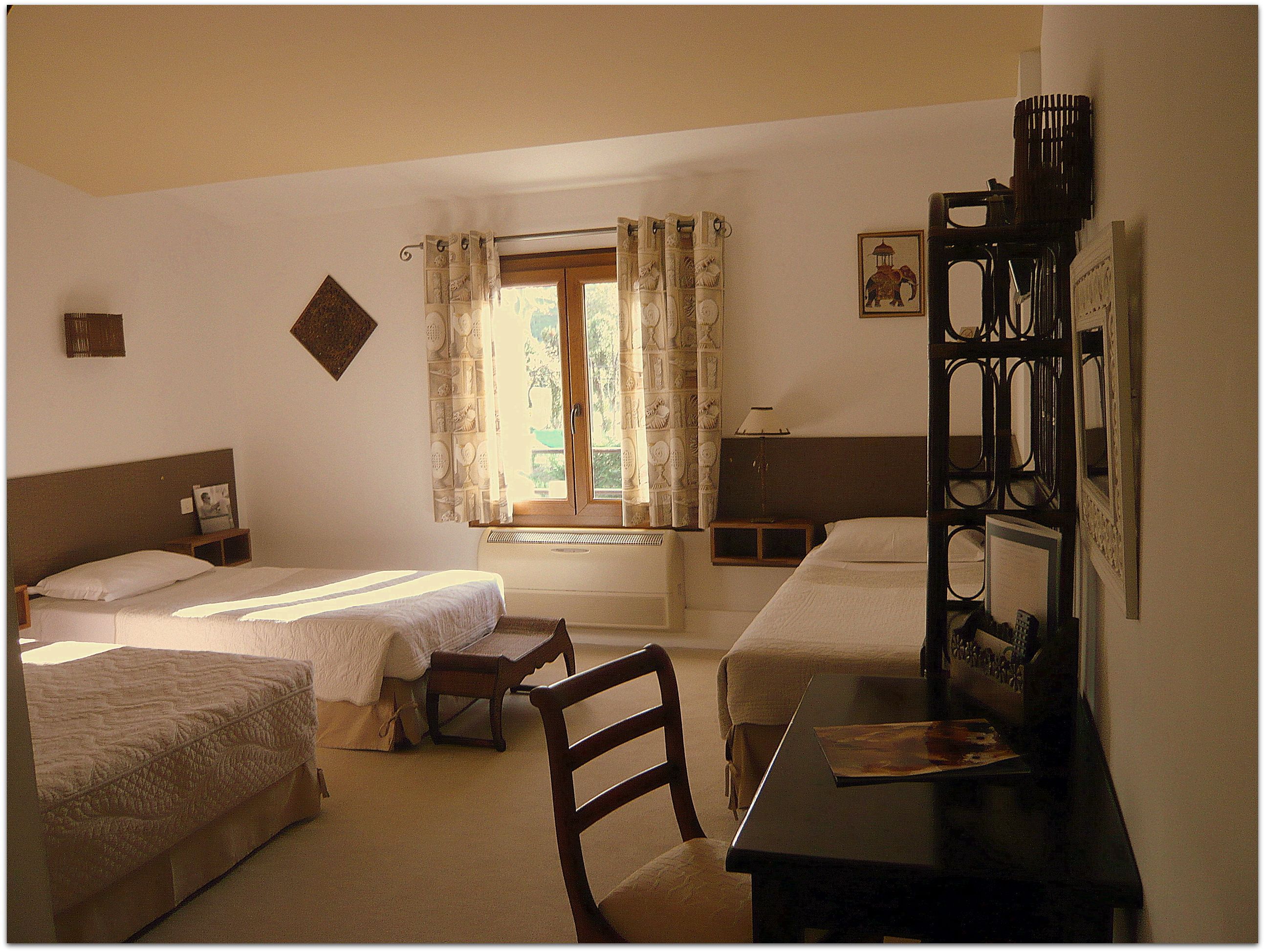 family room | in-room safe, individually decorated, desk, blackout curtains