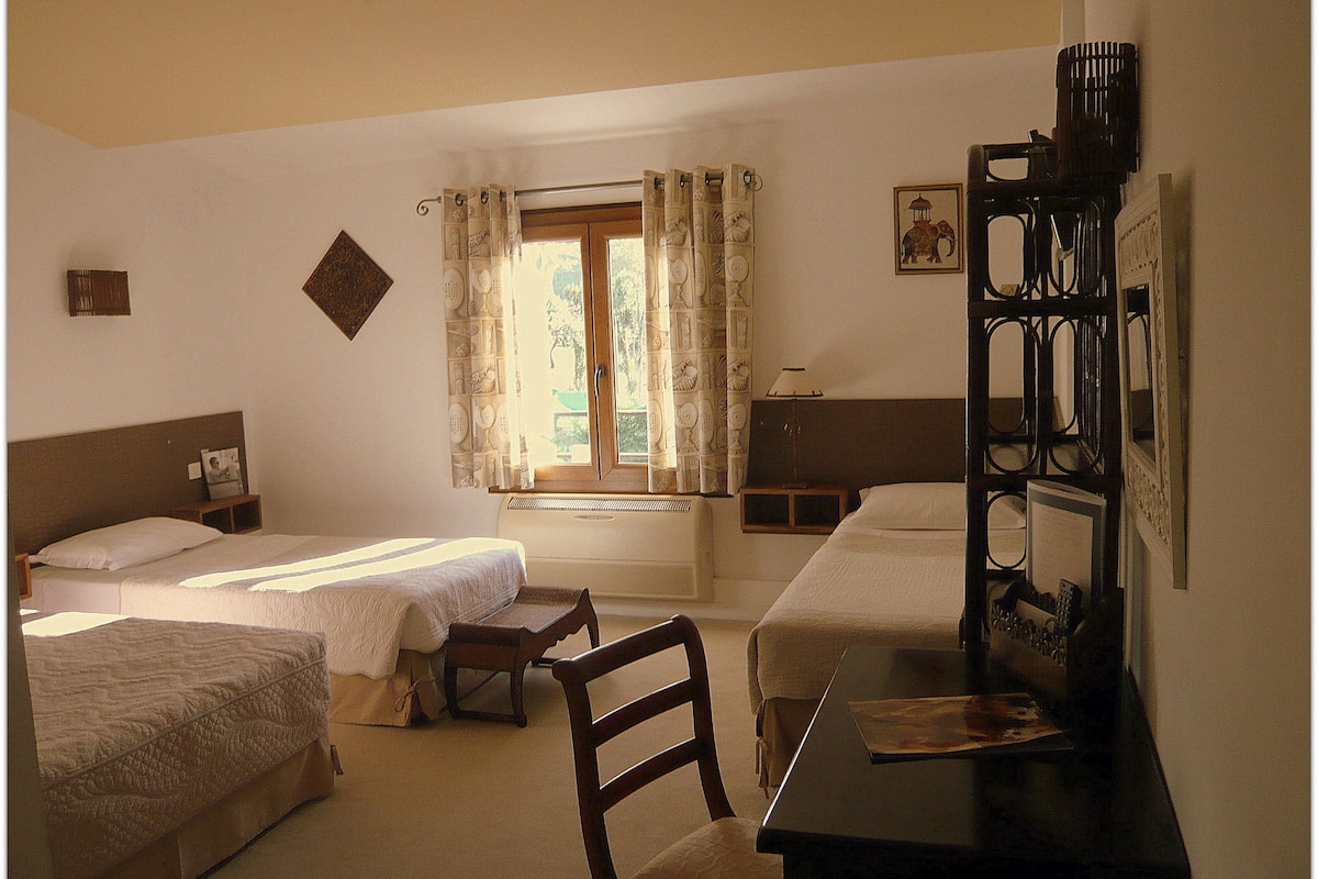 family room | in-room safe, individually decorated, desk, blackout curtains