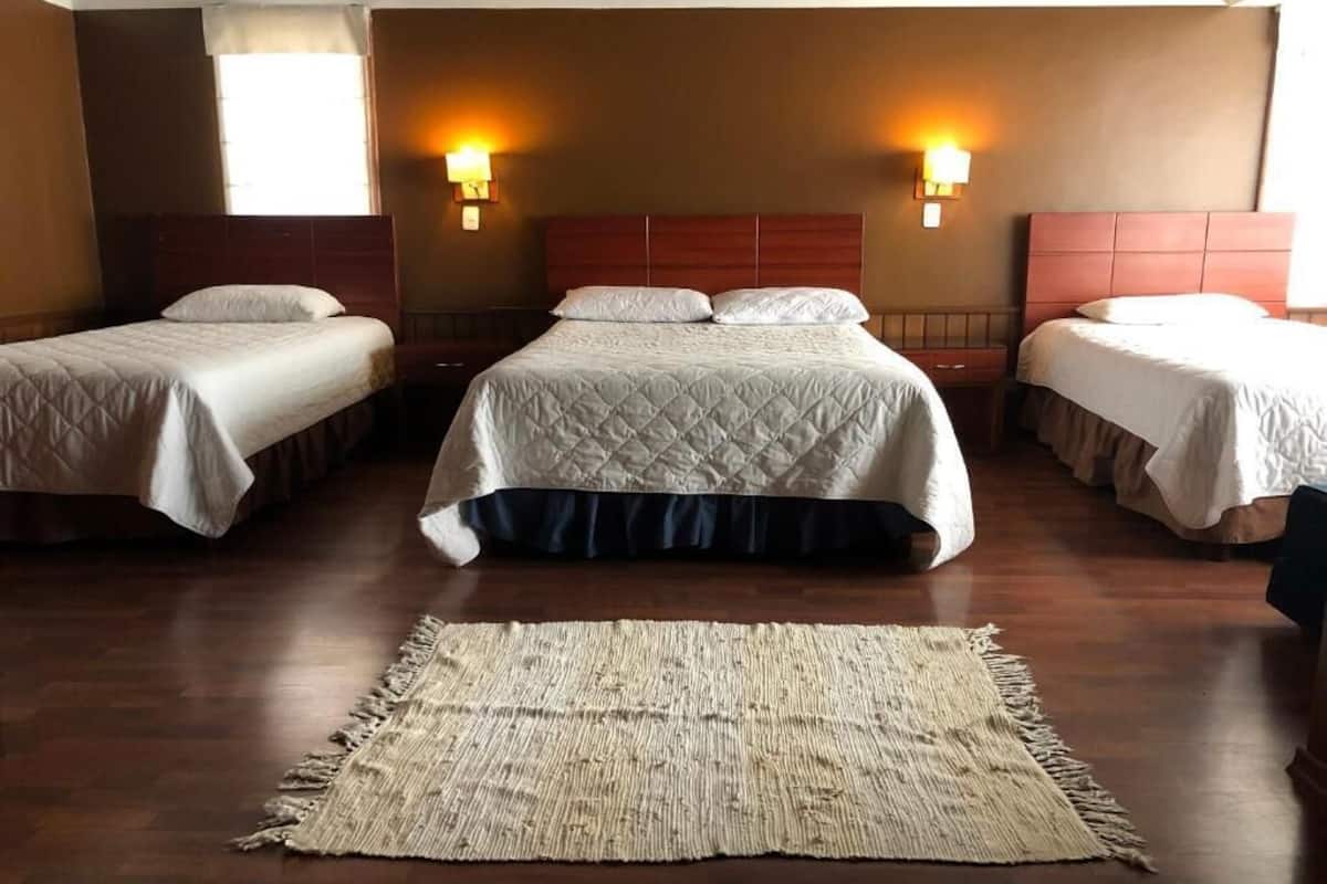 Family Quadruple Room | Blackout drapes, iron/ironing board (on request), WiFi (free)