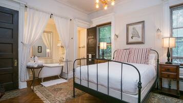 The Parlor Suite | Premium bedding, iron/ironing board, rollaway beds, free WiFi