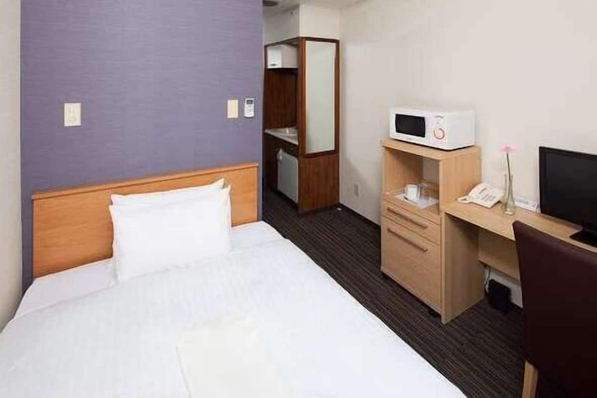 Desk, blackout curtains, iron/ironing board, WiFi