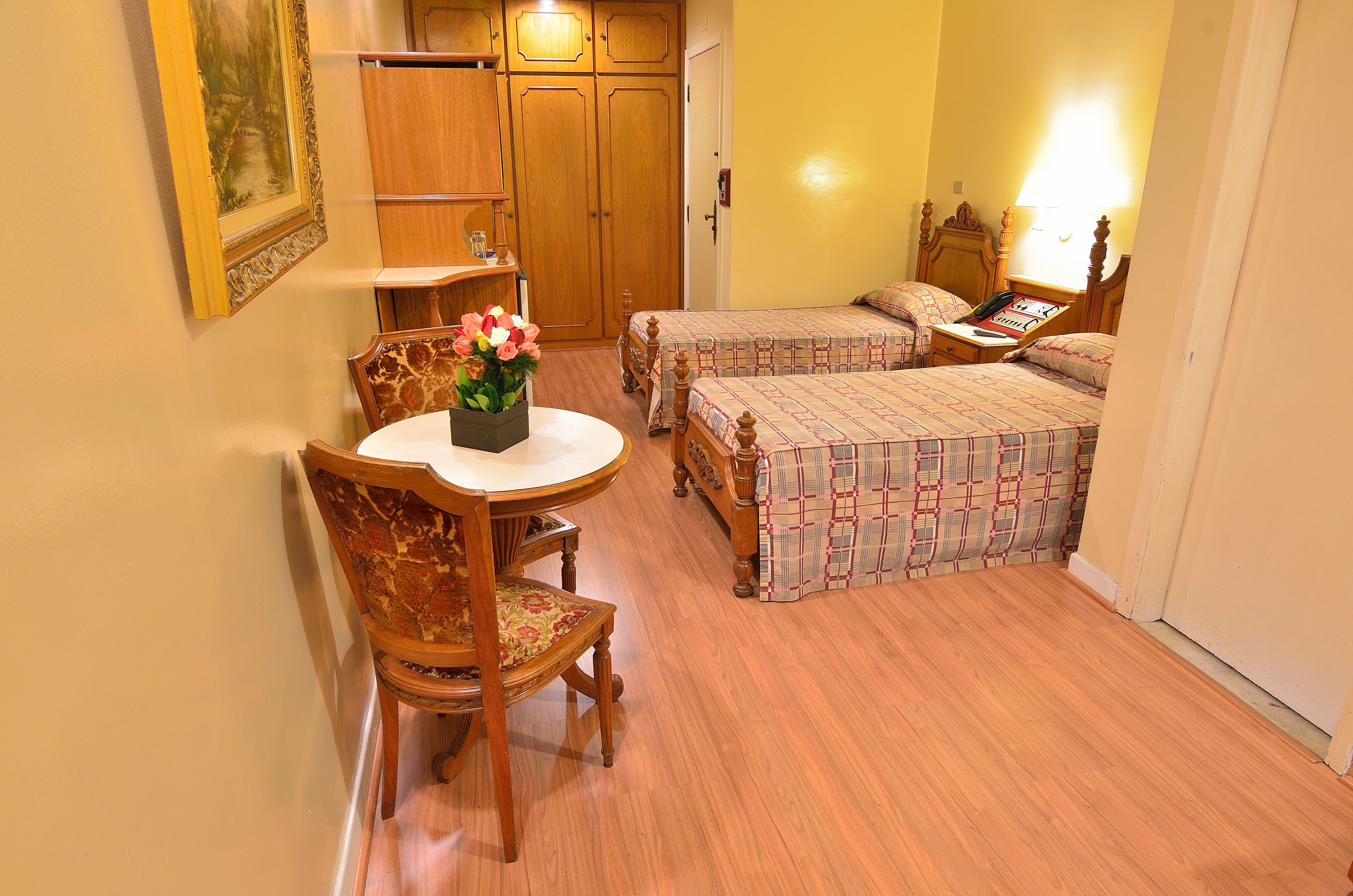 twin room, 2 single beds | 1 bedroom, minibar, desk, blackout curtains