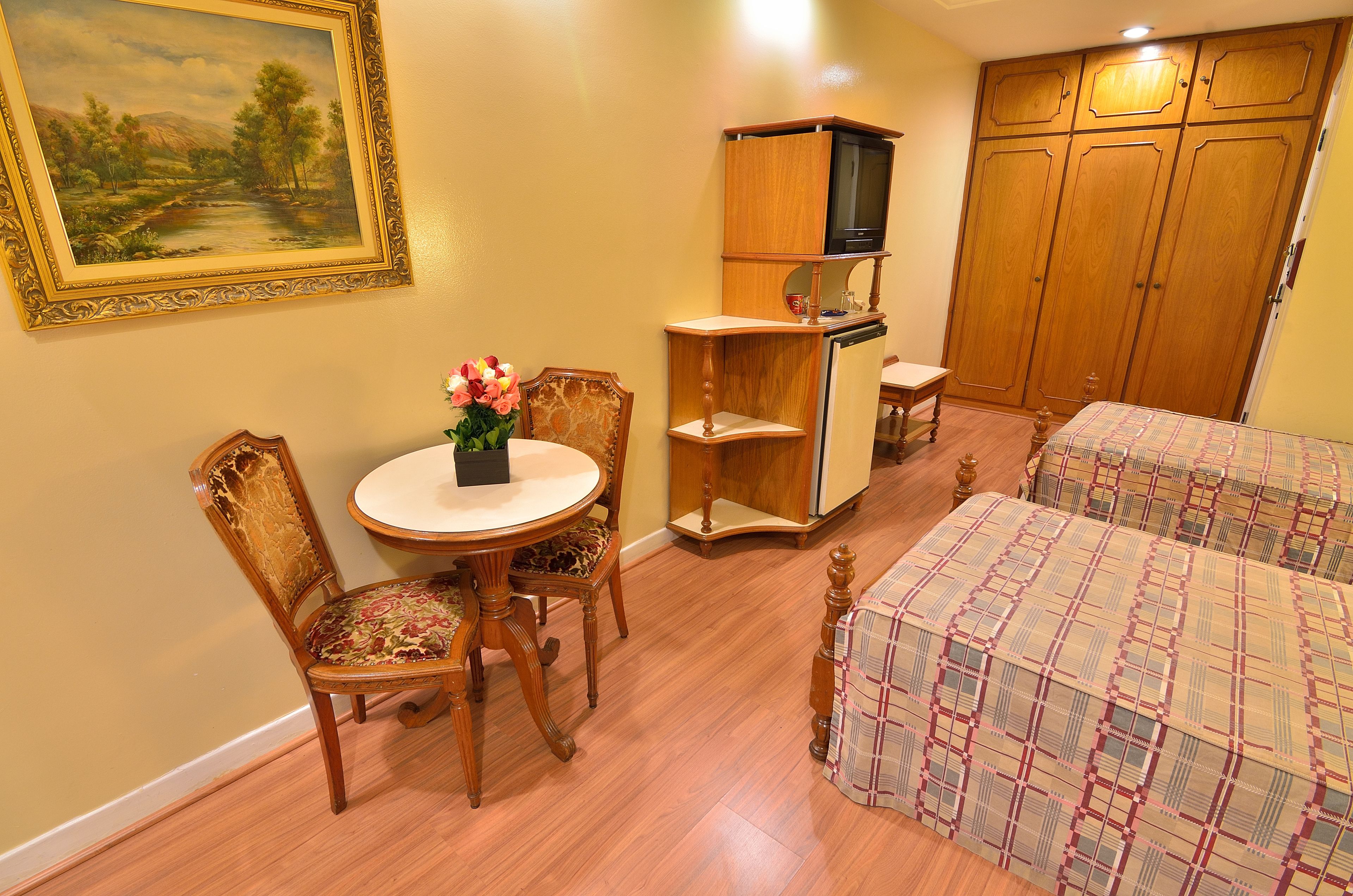 twin room, 2 single beds | 1 bedroom, minibar, desk, blackout curtains