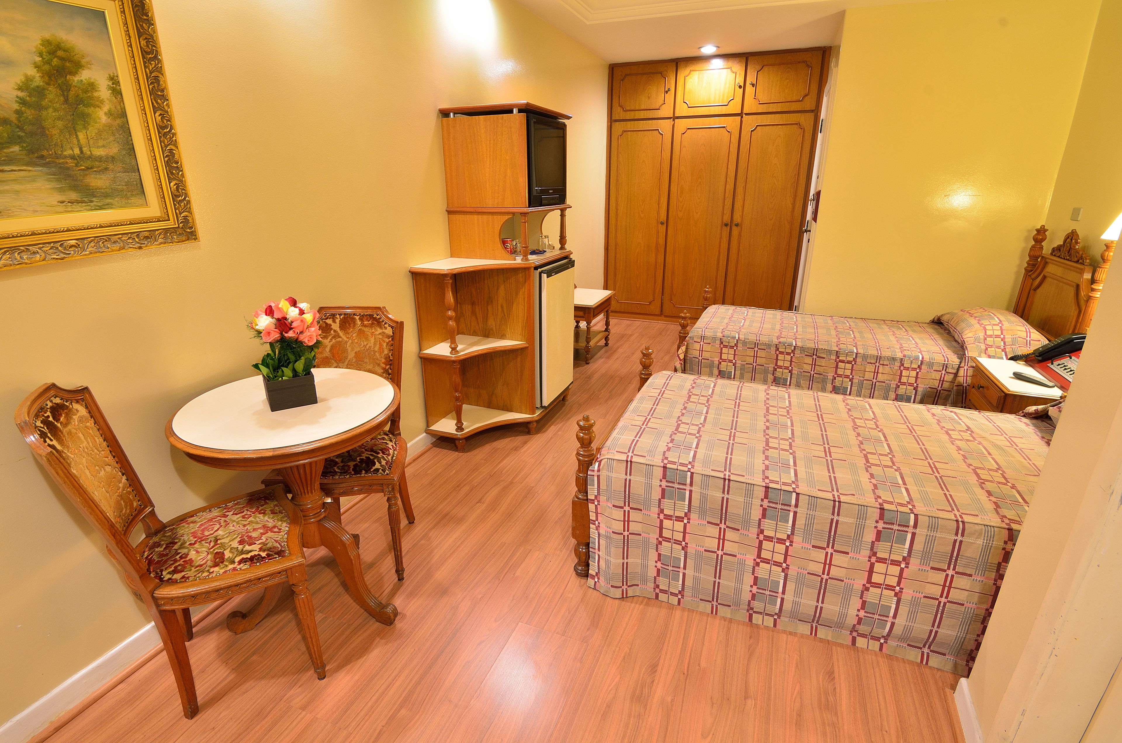 twin room, 2 single beds | 1 bedroom, minibar, desk, blackout curtains