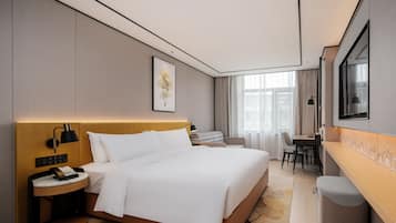Room, 1 King Bed | Down duvets, in-room safe, individually decorated, desk