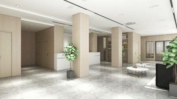 A spacious lobby with a marble floor, large pillars, and a reception desk. - GreenTree Inn Smart Selection Hotel (Guanyun Wenzhou Trade City Jiulong Square Branch) (Lianyungang)