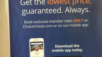 A promotional banner for booking exclusive member rates on ChoiceHotels.com or their mobile app.