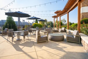 Outdoor pool, open 7 AM to 10 PM, pool umbrellas, sun loungers