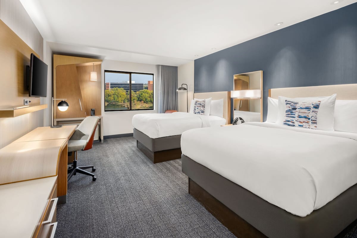 room, 2 queen beds, river view | in-room safe, desk, laptop workspace, blackout curtains