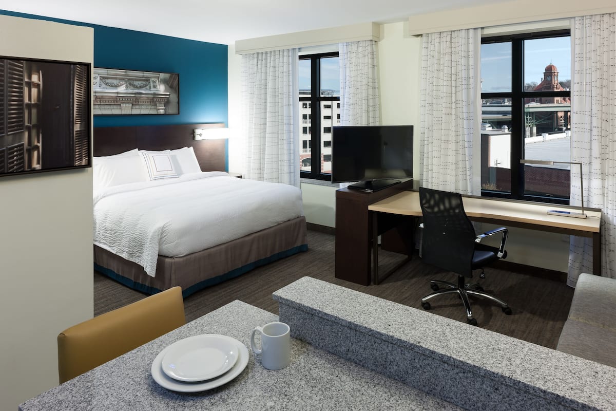 desk, blackout curtains, iron/ironing board, free rollaway beds