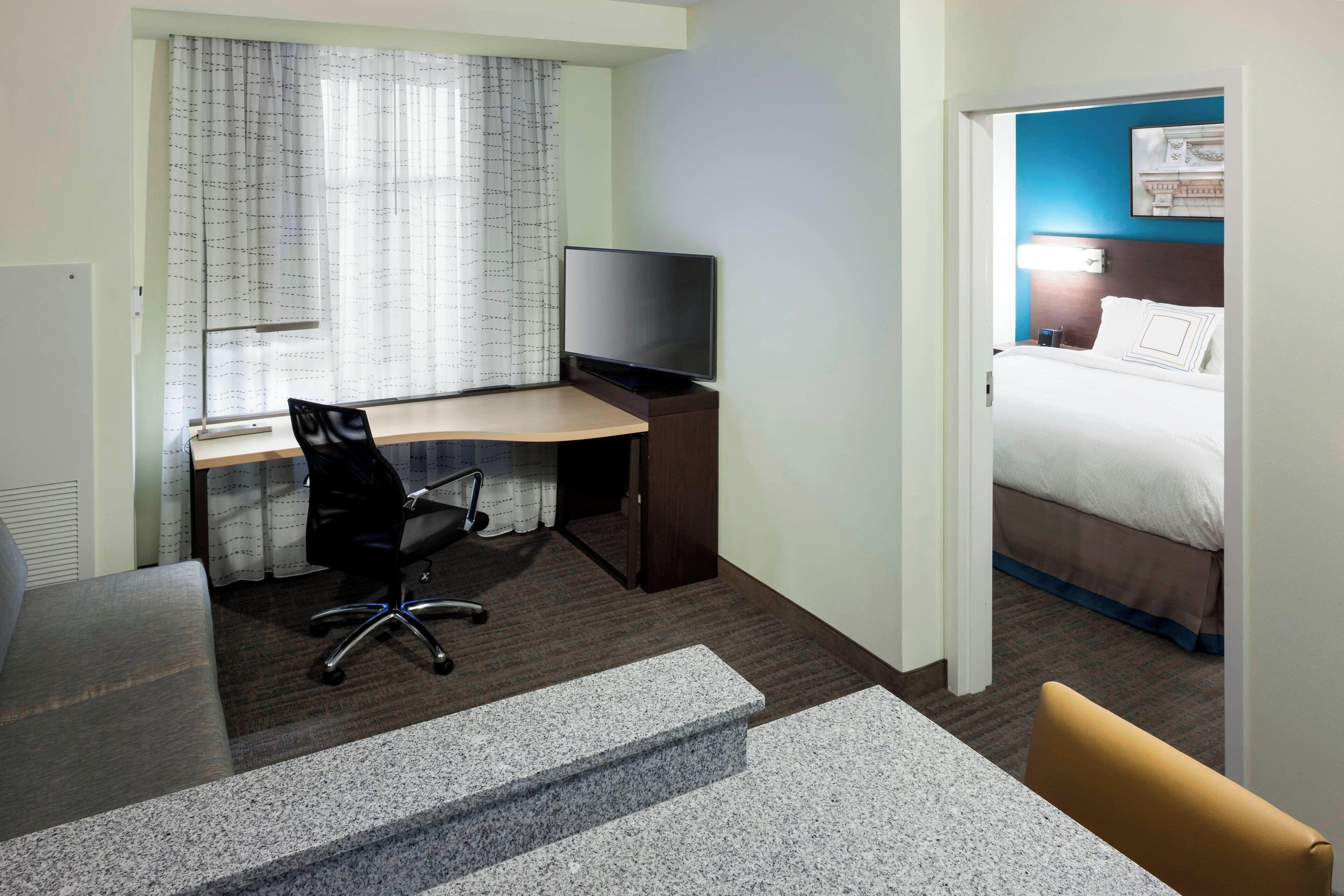 desk, blackout curtains, iron/ironing board, free rollaway beds