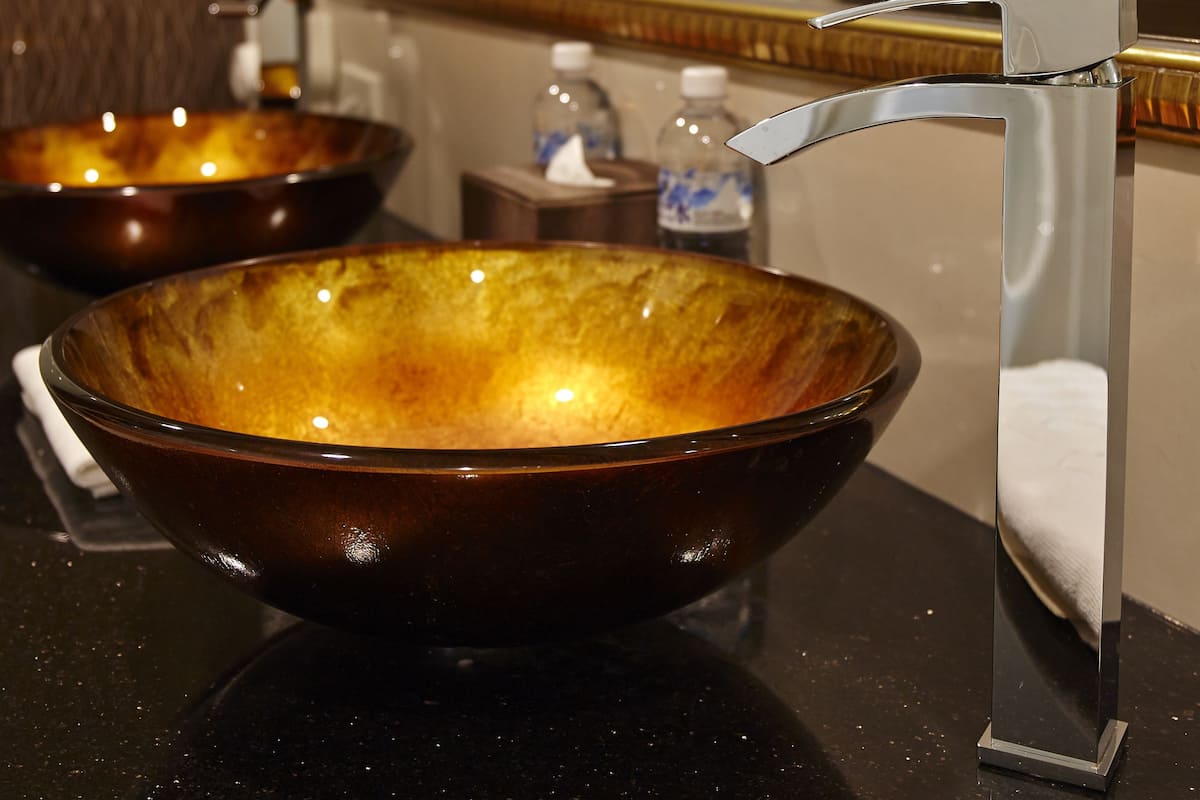 premium studio suite, 1 queen bed, city view, tower | bathroom sink