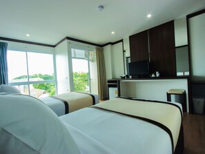 Deluxe Twin Room | Minibar, cortinas opacas, camas supletorias y wifi gratis