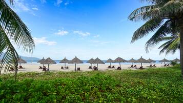 Private beach, white sand, sun-loungers, beach umbrellas