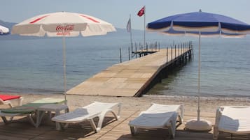 Private beach, sun loungers, beach umbrellas