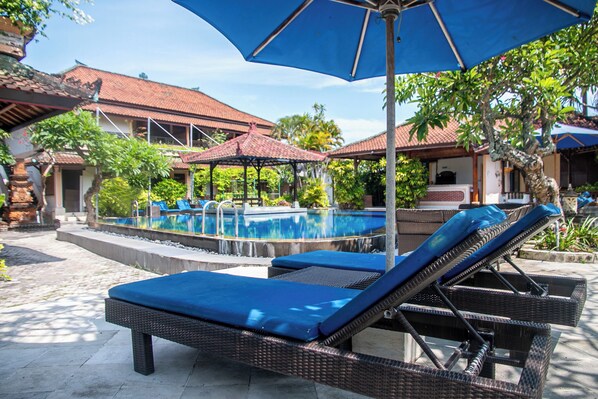 Outdoor pool, pool umbrellas, pool loungers