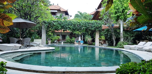 Outdoor pool, pool umbrellas, pool loungers