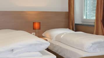 Hypo-allergenic bedding, desk, blackout drapes, soundproofing