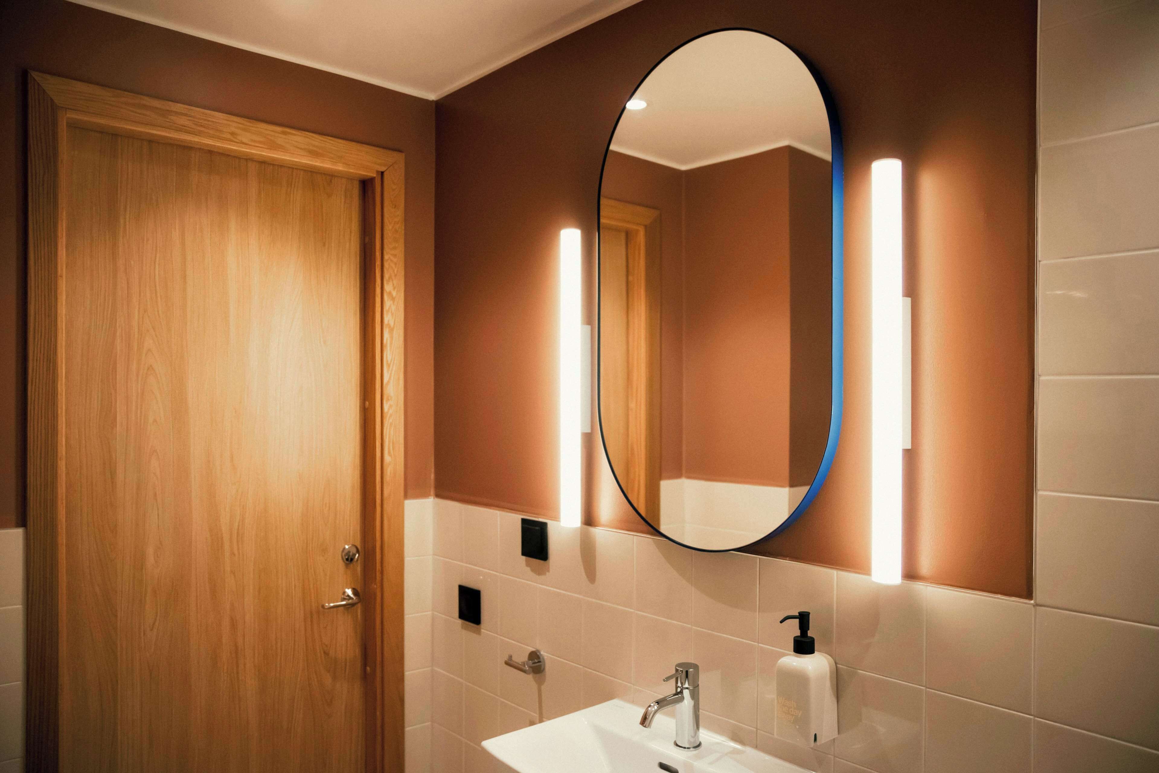 shower, rainfall showerhead, hair dryer, towels