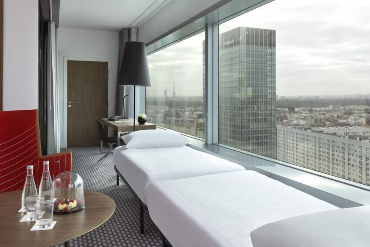 Premium bedding, desk, blackout drapes, soundproofing