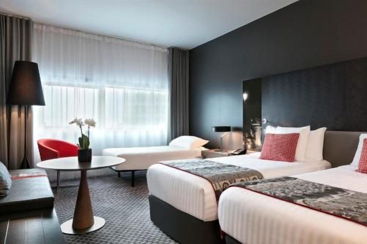 Premium bedding, desk, blackout curtains, soundproofing