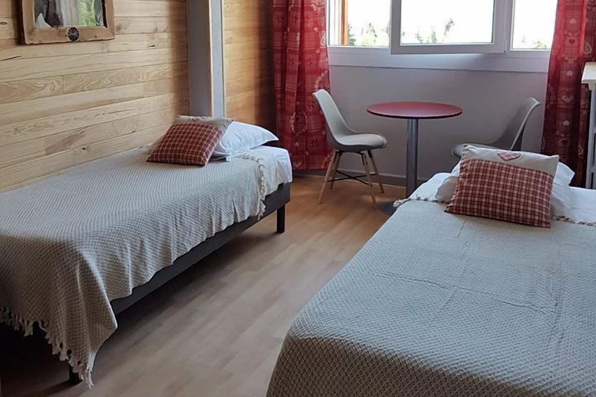 Family Quadruple Room, 2 Bedrooms, Mountain View | Individually decorated, individually furnished, free cribs/infant beds