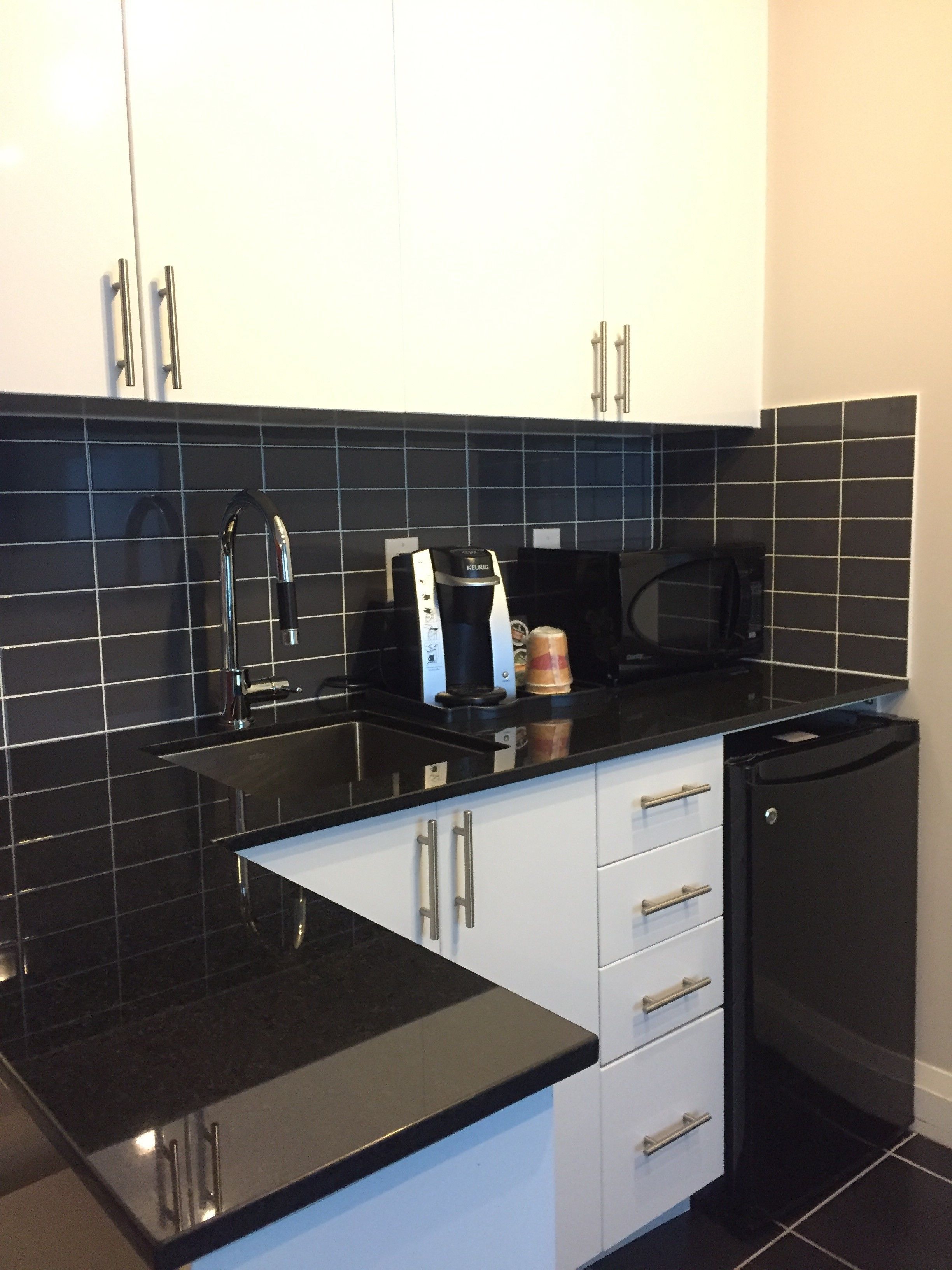 full-sized fridge, microwave, coffee/tea maker