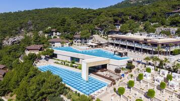 Indoor pool, 4 outdoor pools, cabanas (surcharge), pool umbrellas