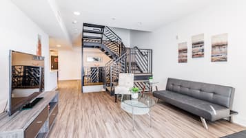 Standard Two-Bedroom on N Poinsettia Place | Living room | 40-inch TV with digital channels, Netflix, streaming services