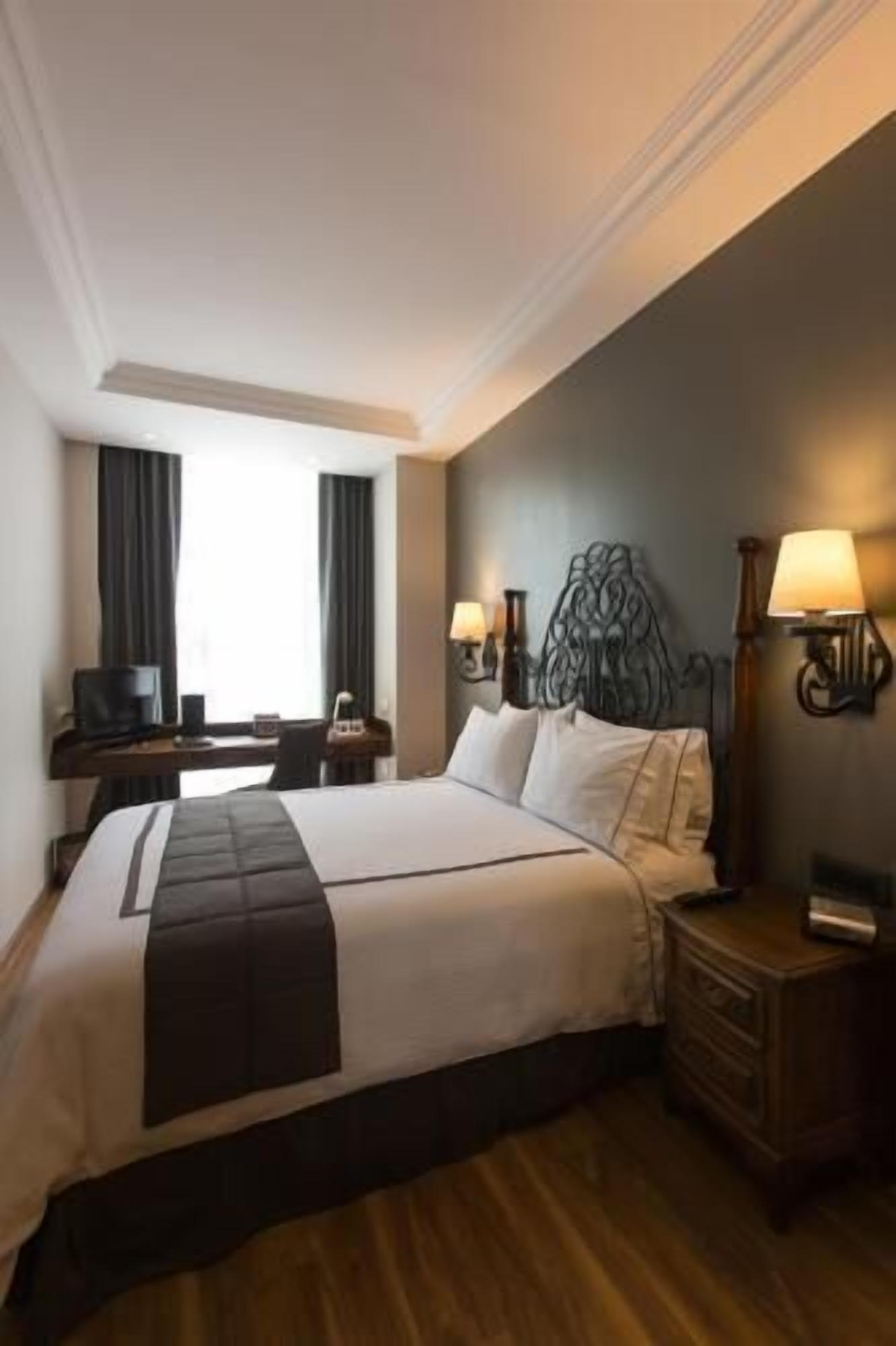 Premium bedding, down comforters, in-room safe, desk