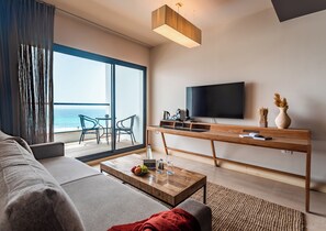 Deluxe Suite | Living area | 32-inch TV with cable channels - Sea life Nahariya BY Jacob Hotels (Nahariya)
