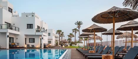 Indoor pool, outdoor pool, open 9:30 AM to 5:00 PM, sun loungers