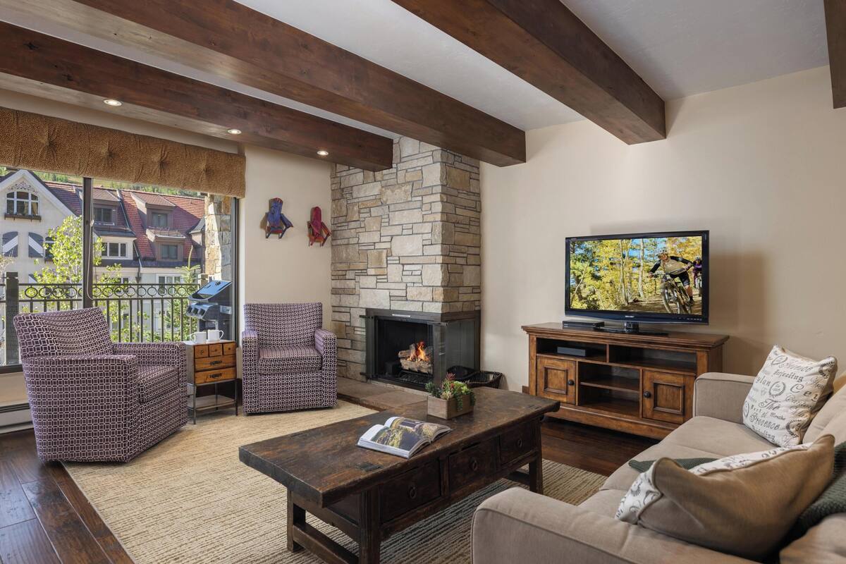 Premier Condo, Fireplace (Landmark 301) | Living area | Flat-screen TV, fireplace