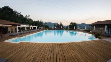 2 outdoor pools, open 10:00 AM to 6:00 PM, pool umbrellas, pool loungers