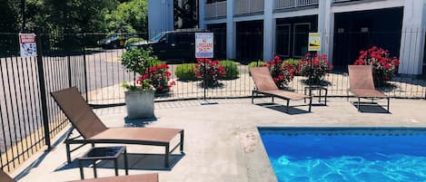 Seasonal outdoor pool, pool loungers