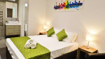 Premium bedding, desk, blackout drapes, soundproofing