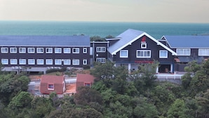 A building with multiple windows and a sign that reads "PAX-SK". - Grampus Resort Shirahama (Shirahama)
