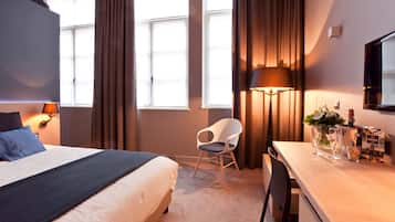 Ropa de cama de alta calidad, minibar y escritorio
