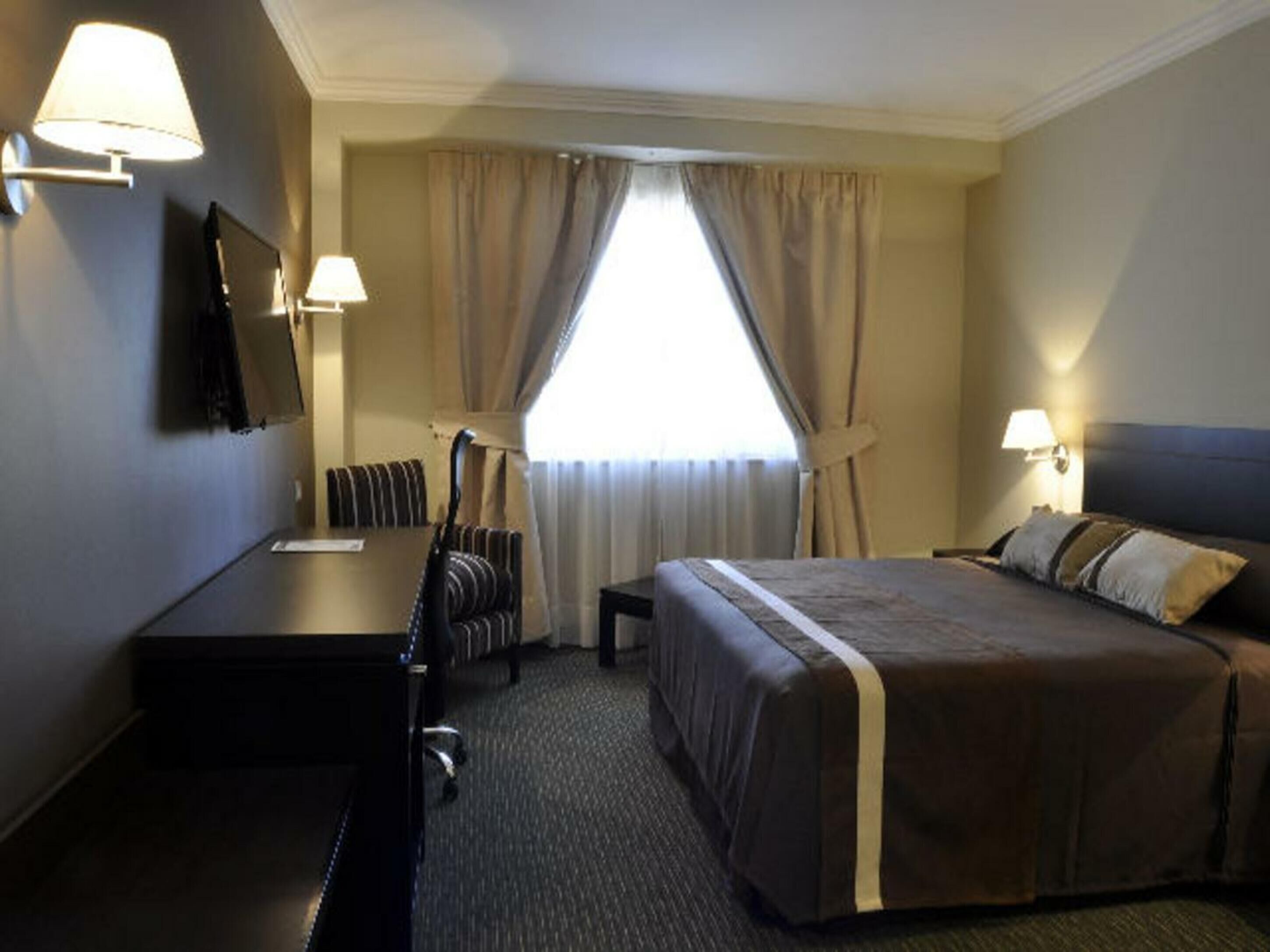 standard single room | 1 bedroom, minibar, in-room safe, desk