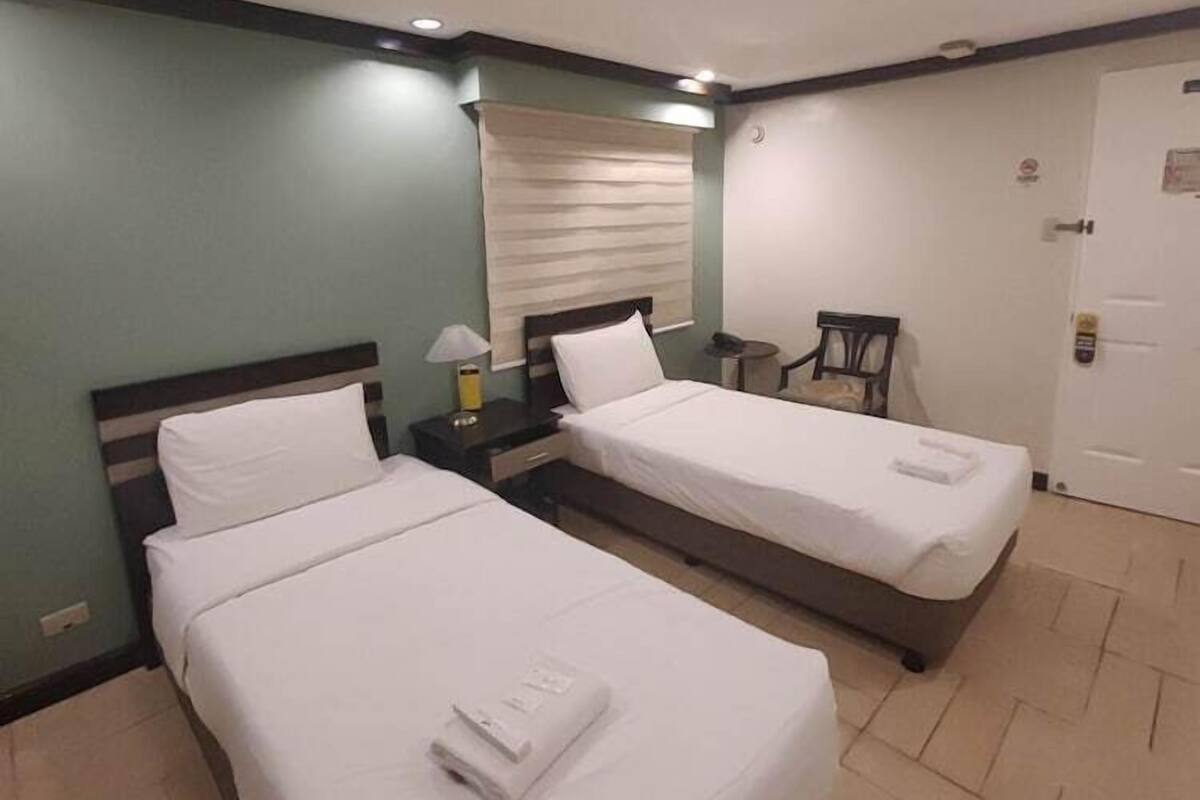 Cofres nos quartos, roupa de cama