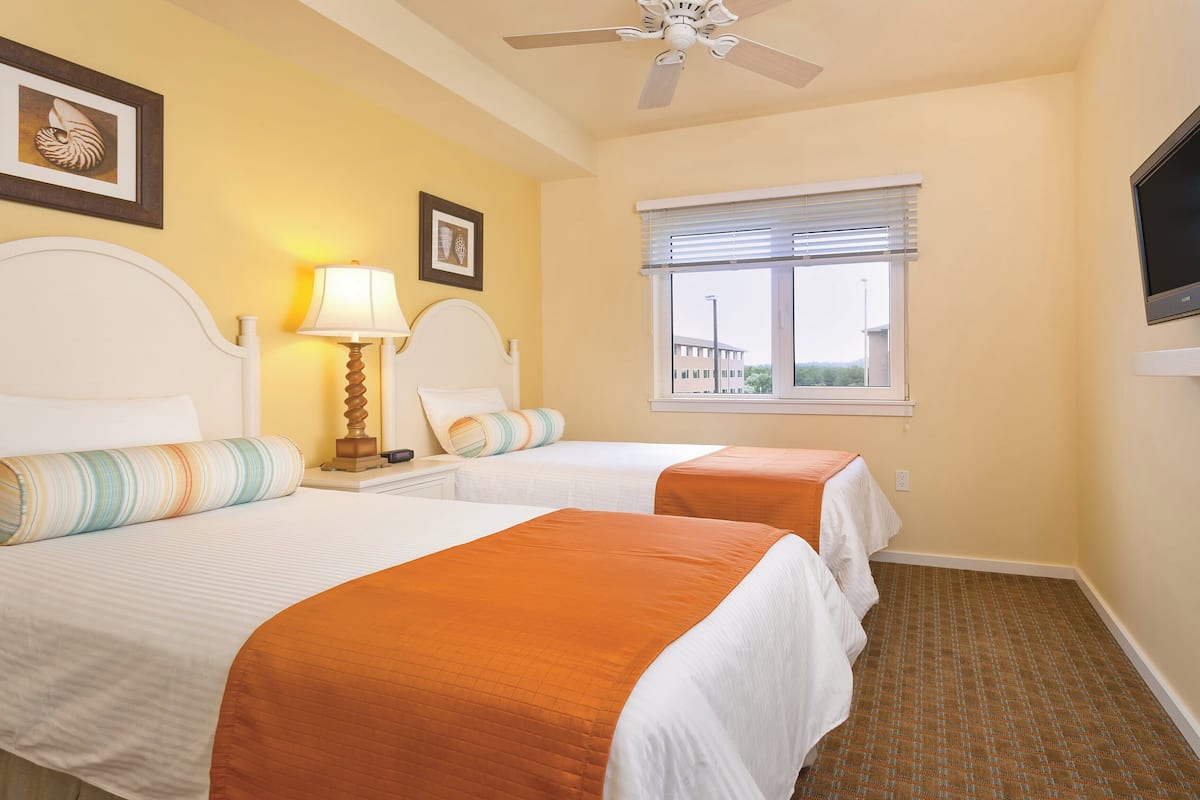 standard condo, 2 bedrooms, kitchen (queen murphy bed) | minibar, iron/ironing board, wifi, bed sheets