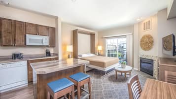 Televisión LCD, chimenea y reproductor de DVD