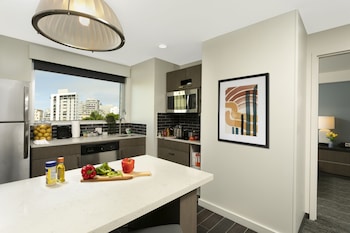 One Bedroom King Suite | Private kitchen | Fridge, coffee/tea maker at Hyatt House San Juan