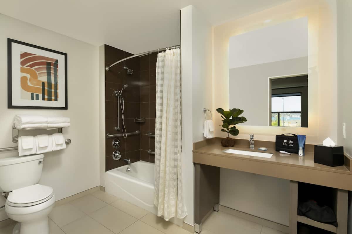 Suite, Accessible Bathtub, Bay View | Bathroom | Combined shower/tub, designer toiletries, hair dryer, towels