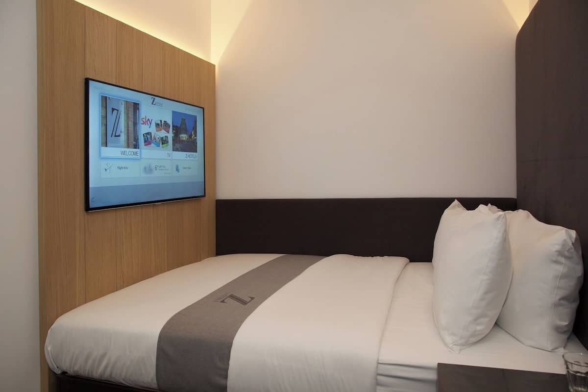 Inside Queen Accessible Room | Individually furnished, desk, laptop workspace, blackout curtains
