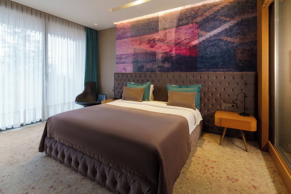 ห้องดีลักซ์, วิวสวน | ผ้าปูที่นอนฝ้ายอียิปต์, เครื่องนอนระดับพรีเมียม, ตู้นิรภัยในห้องพัก