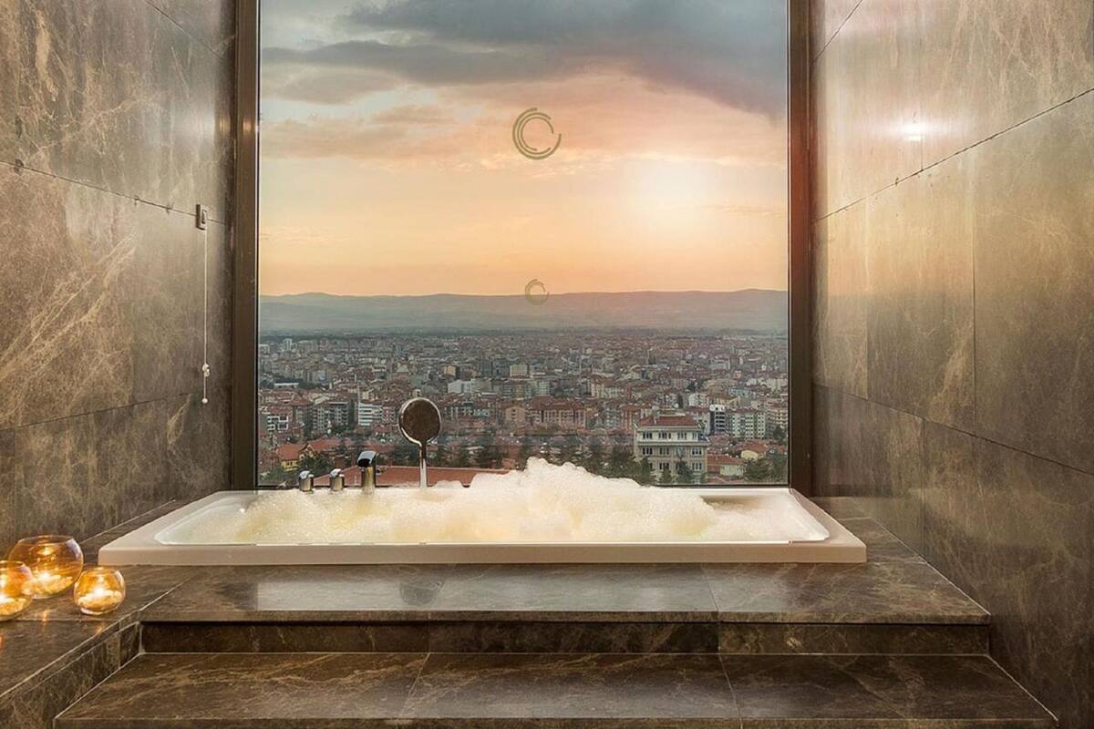 grand suite | bathroom | eco-friendly toiletries, hair dryer, slippers, towels