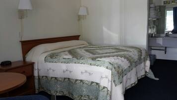 Premium bedding, pillow-top beds, blackout curtains, iron/ironing board