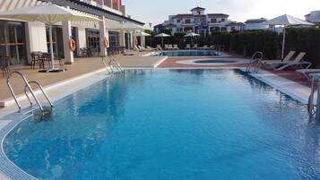 2 outdoor pools, pool umbrellas, sun loungers